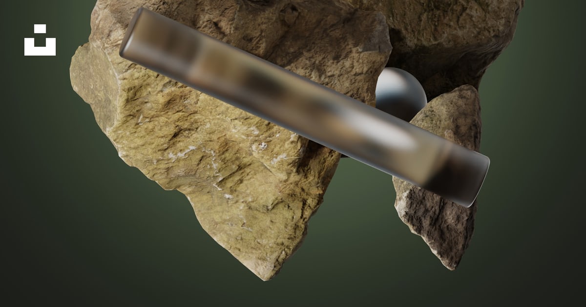 A rock with two metal rods sticking out of it photo – Free Threedee ...