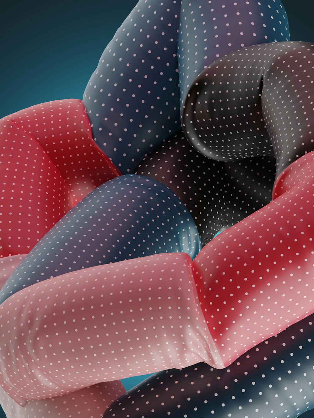 a group of pillows with polka dots on them