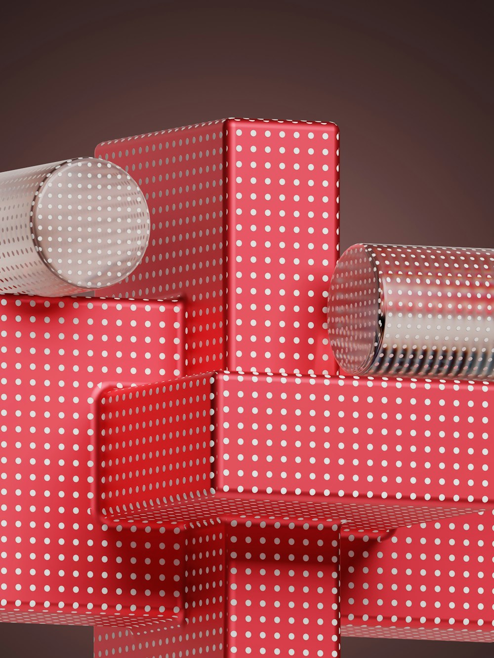 a stack of red and white boxes with polka dots