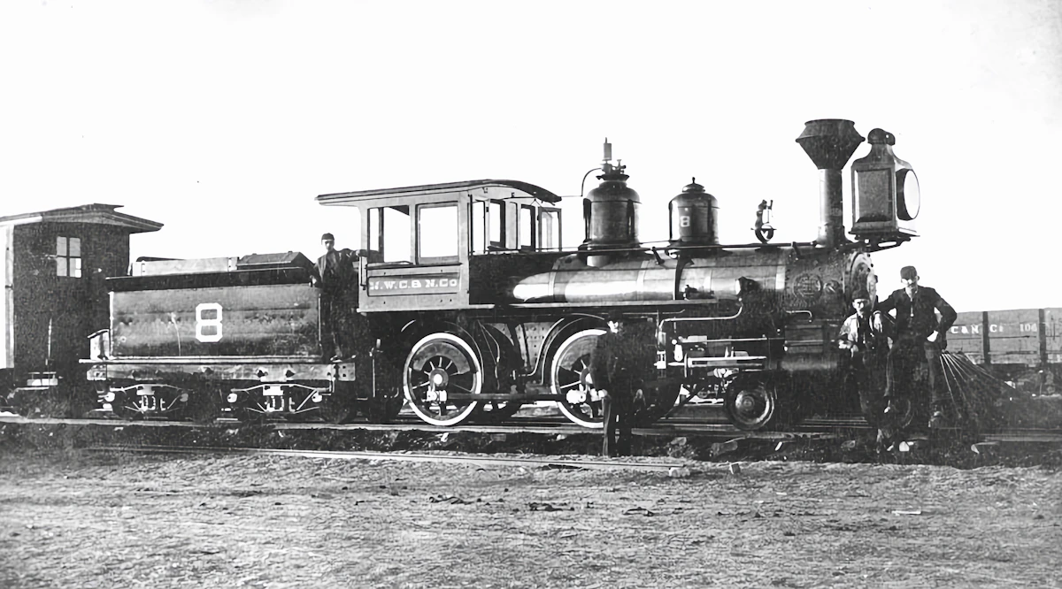 A passenger train travelling along a railroad track