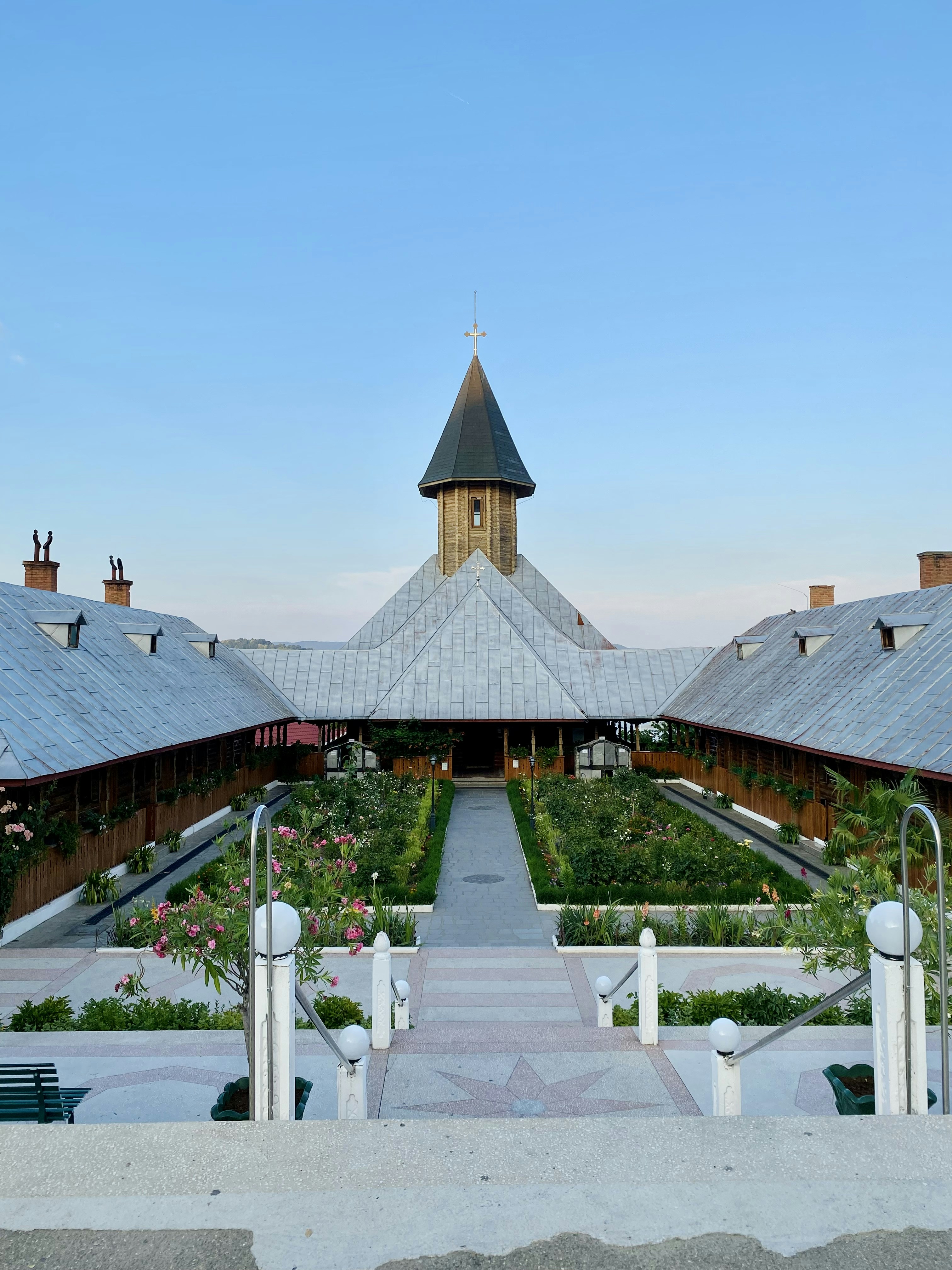 a building with a steeple and a clock tower