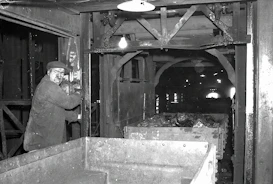 Industrial mineral processing facility with machinery at work