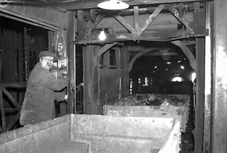 Industrial mineral processing facility with machinery at work