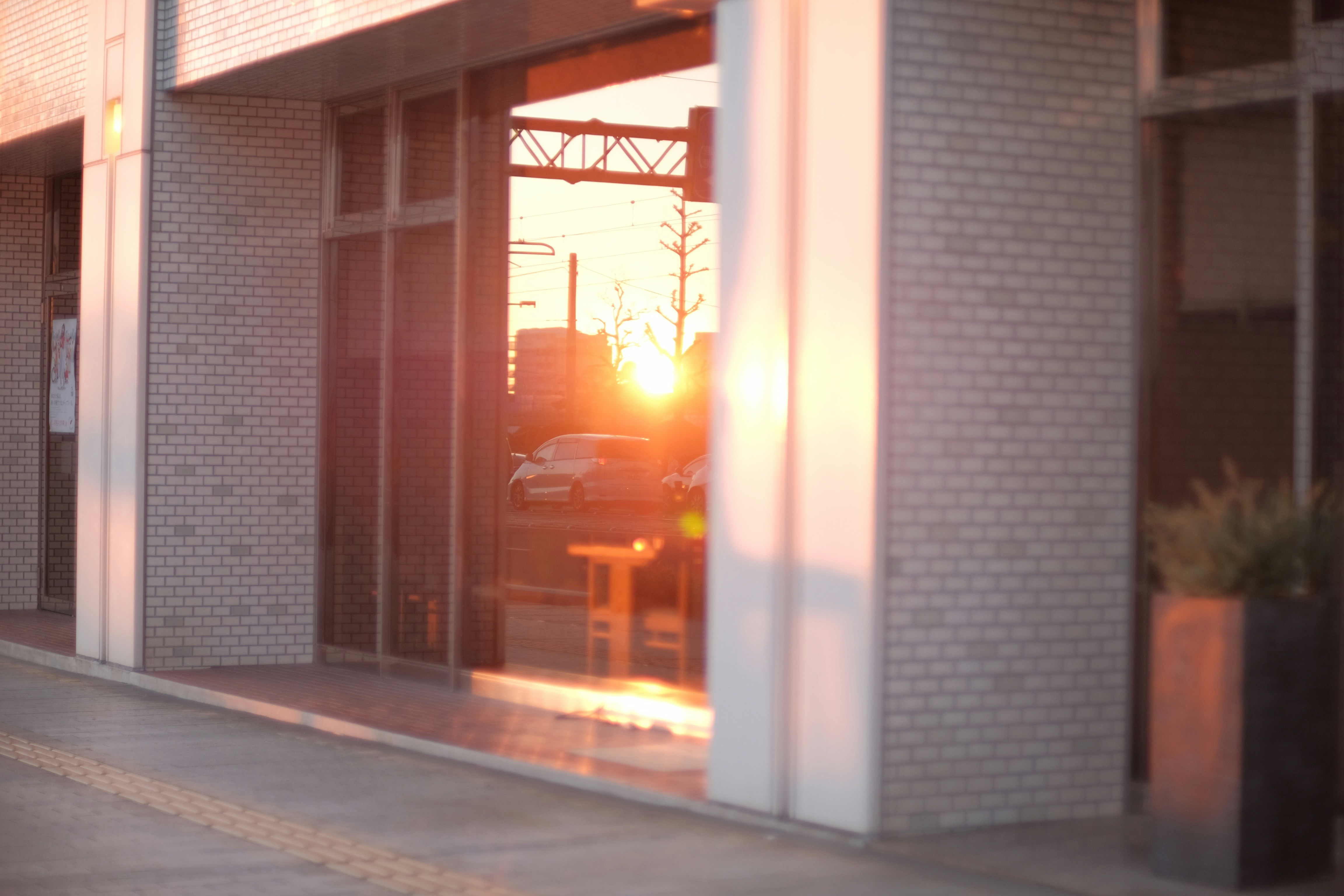 the sun is shining through the window of a building