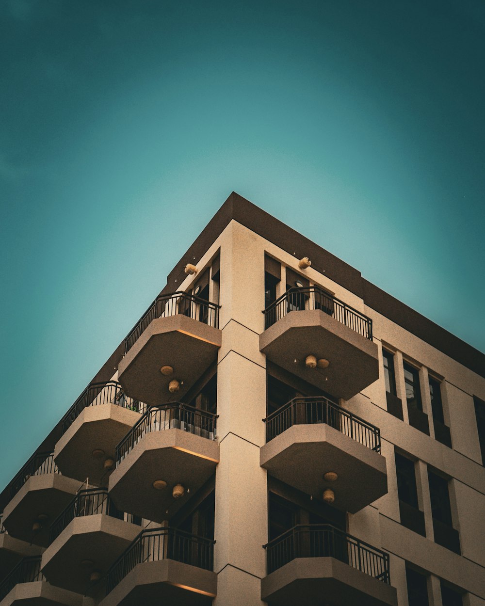 a tall building with balconies and balconies on the balconies