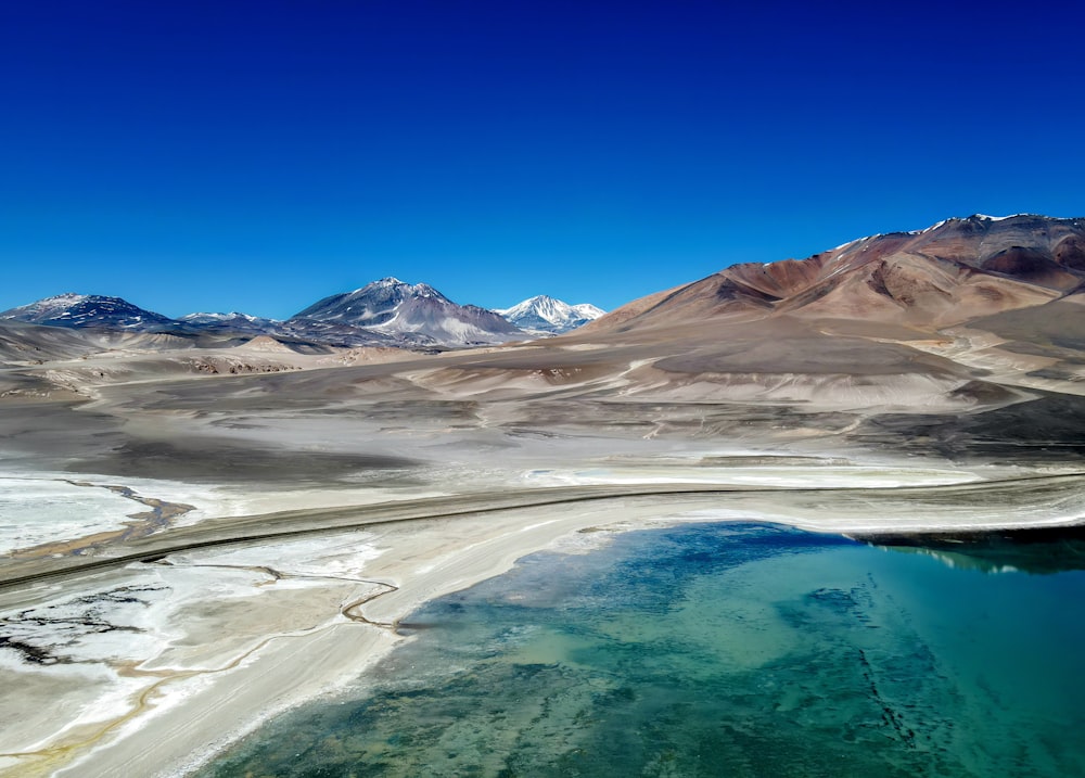 a large body of water surrounded by mountains