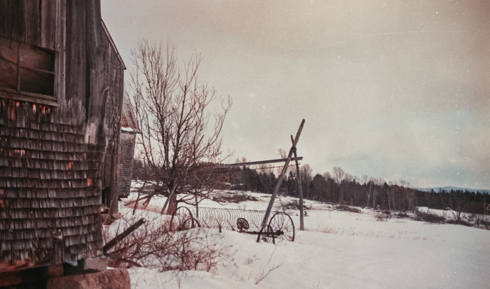 an old photo of a bike leaning against a building