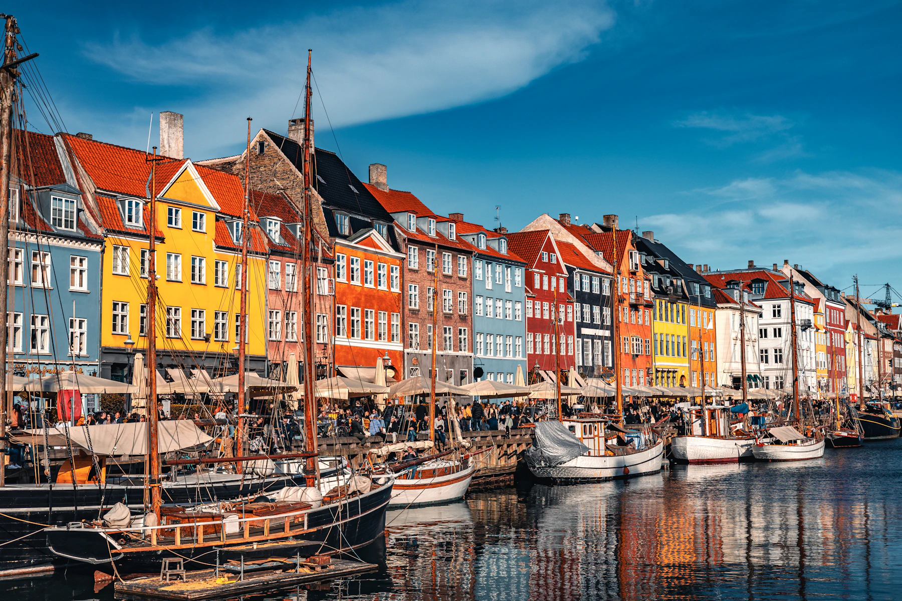Colourful buildings and boats lining Copenhagen's Nyhavn canal