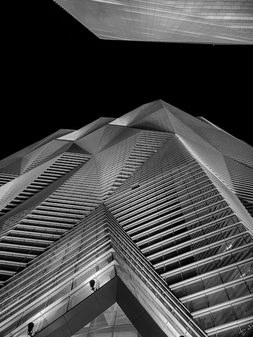 a black and white photo of a tall building