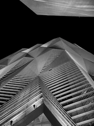 a black and white photo of a tall building