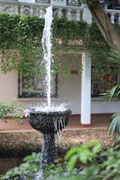 Water fountain in front of a client’s building, showcasing Hedgie Wilder’s custom water feature