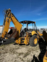 Yellow backhoe loader