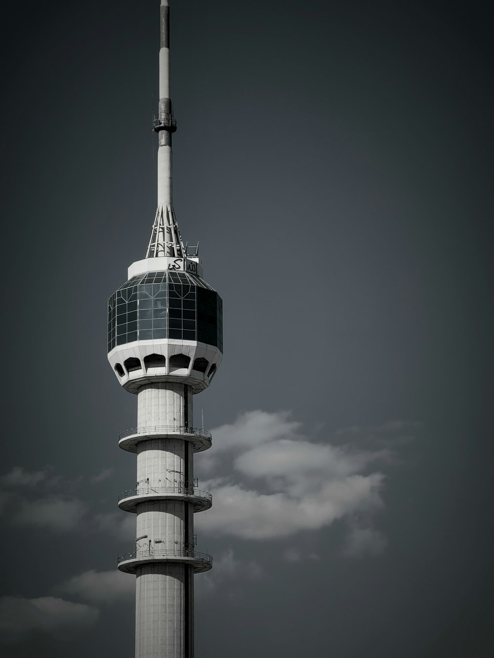 a tall tower with a sky background