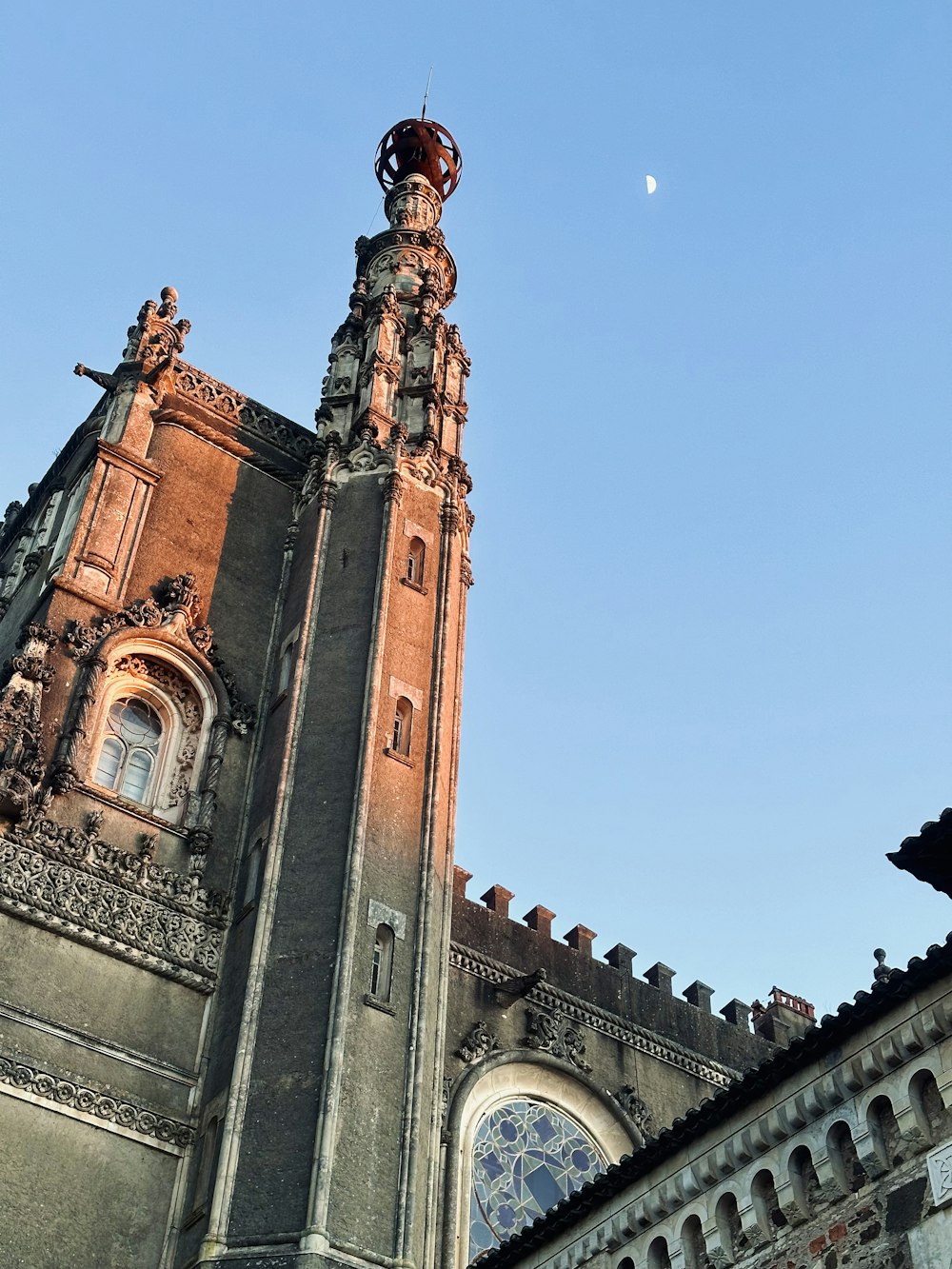 a tall tower with a clock on top of it