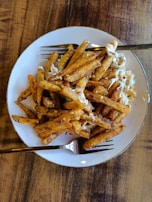 Golden, crispy peri peri fries served with a side of our house special SP secret sauce.