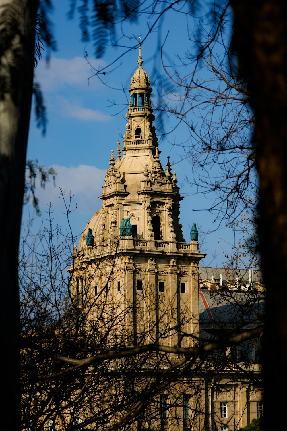 a tall tower with a clock on the top of it