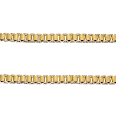 Two parallel gold chains are positioned horizontally against a plain white background. The links of the chains are cylindrical and interconnected evenly.