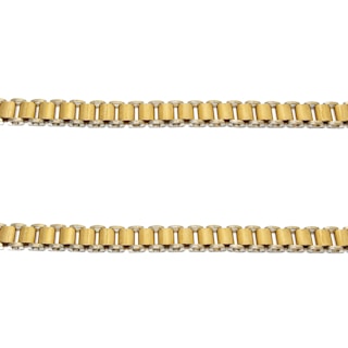 Two parallel gold chains are positioned horizontally against a plain white background. The links of the chains are cylindrical and interconnected evenly.