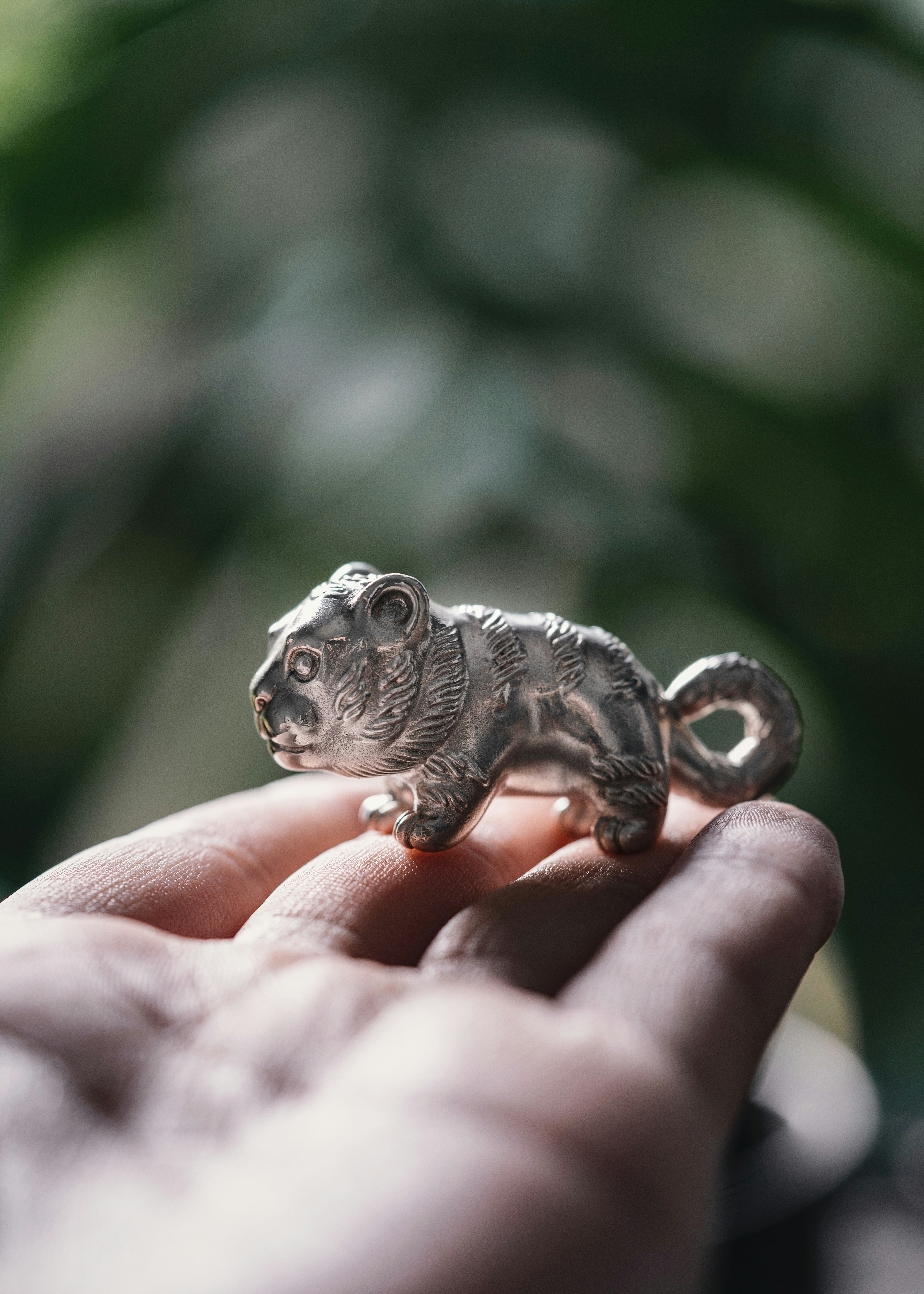 Small toy animal in hand