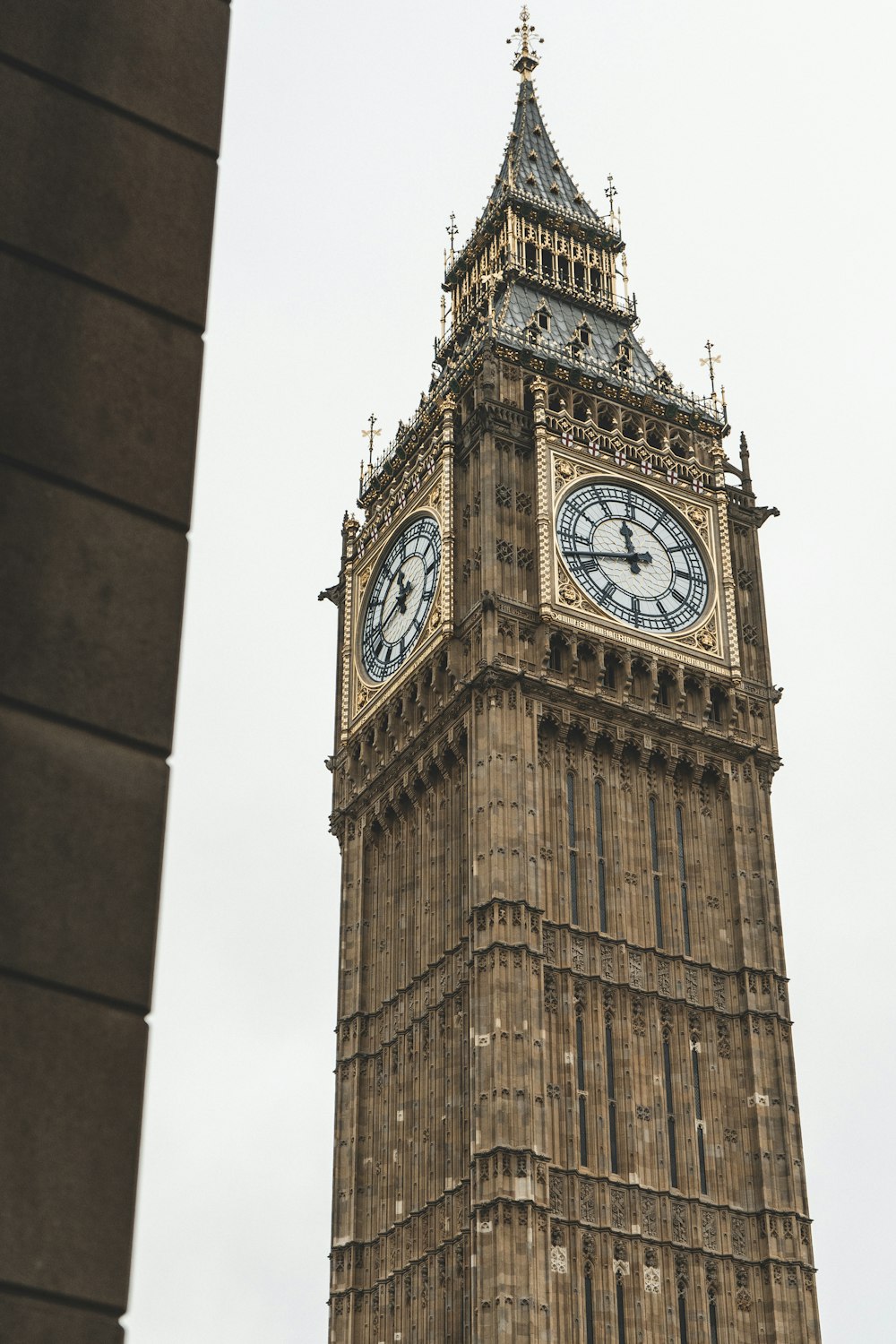 a tall clock tower with a sky background