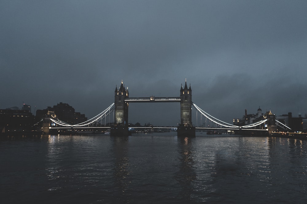 a view of the london bridge at night