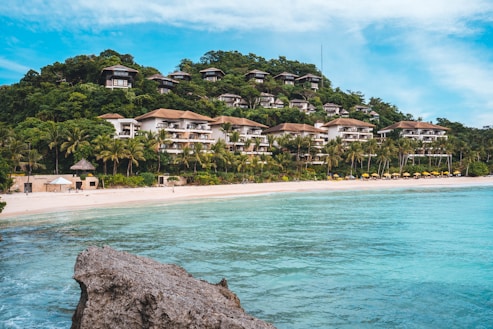 a beach with a large building on top of it