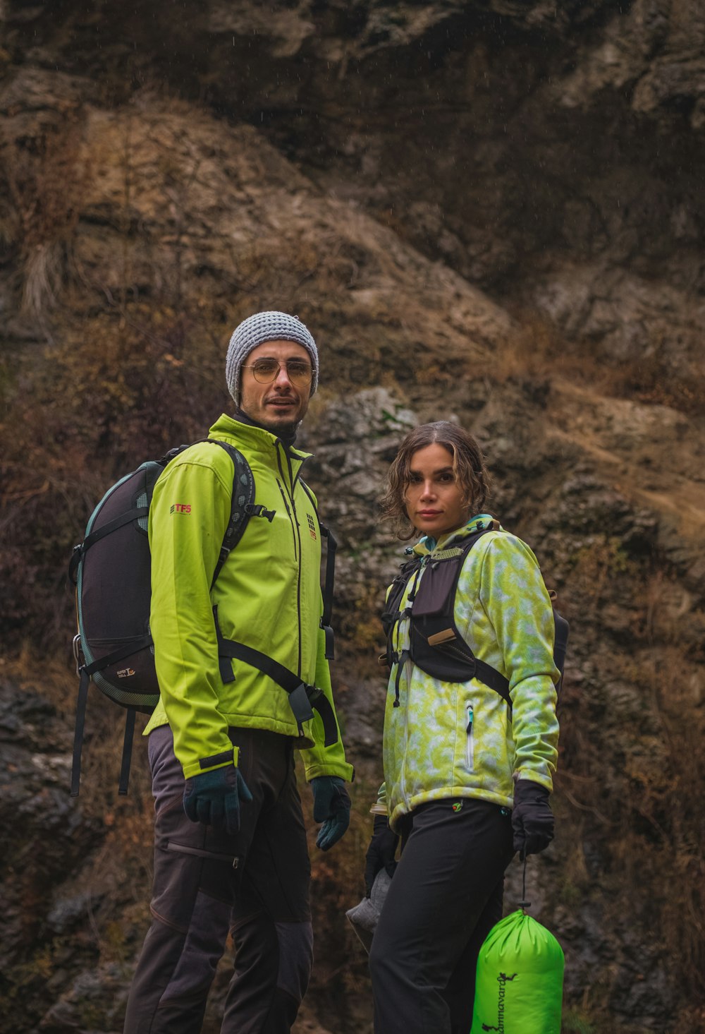 a man and a woman standing next to each other