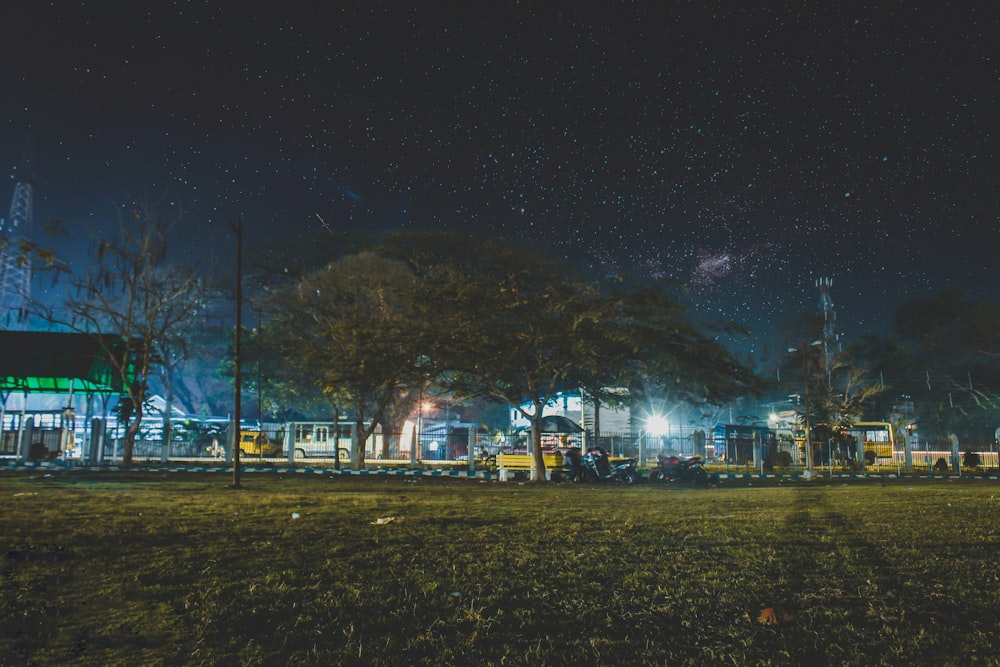 a night time scene of a gas station