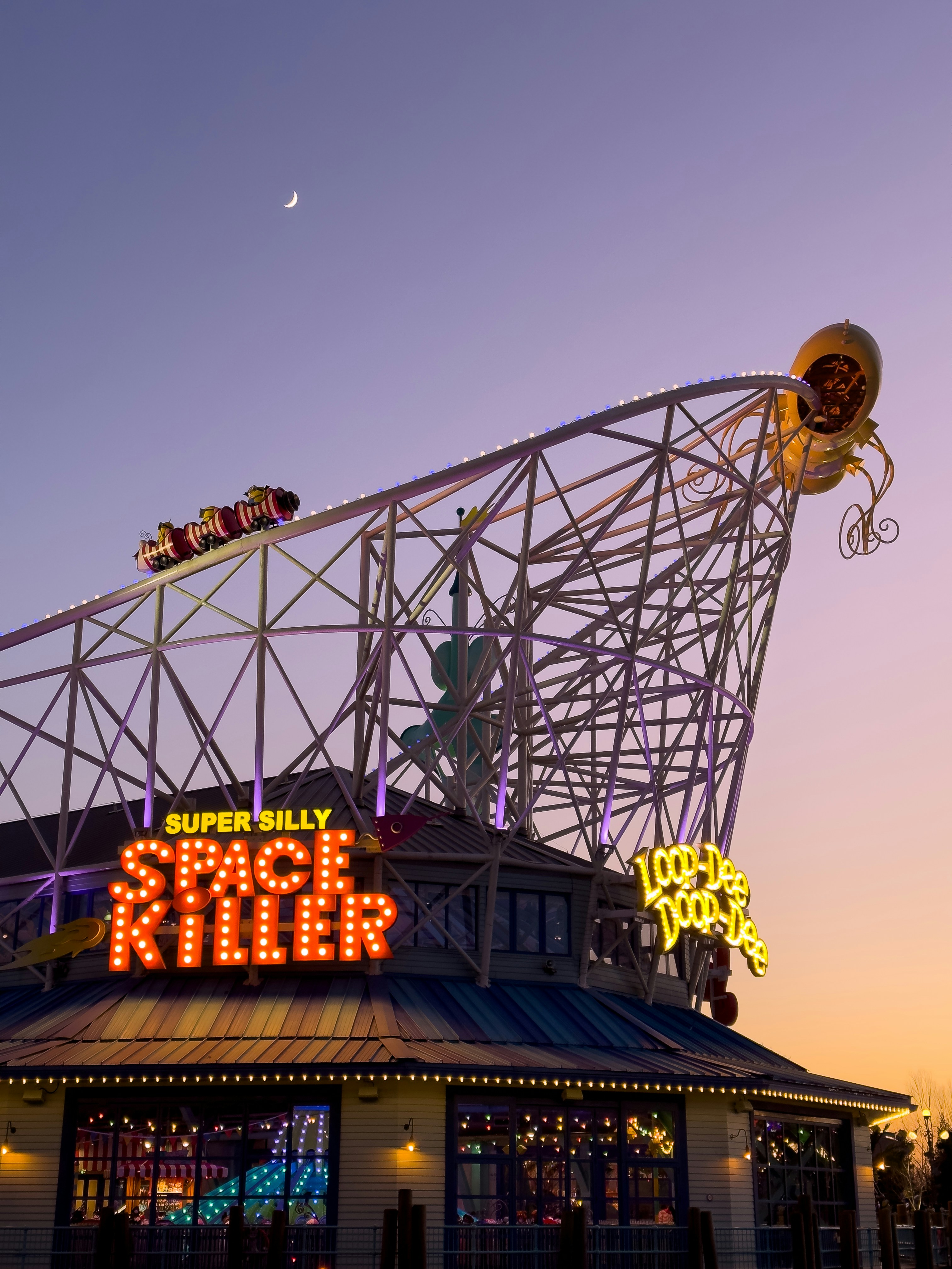 a ferris wheel at a carnival with a sky background