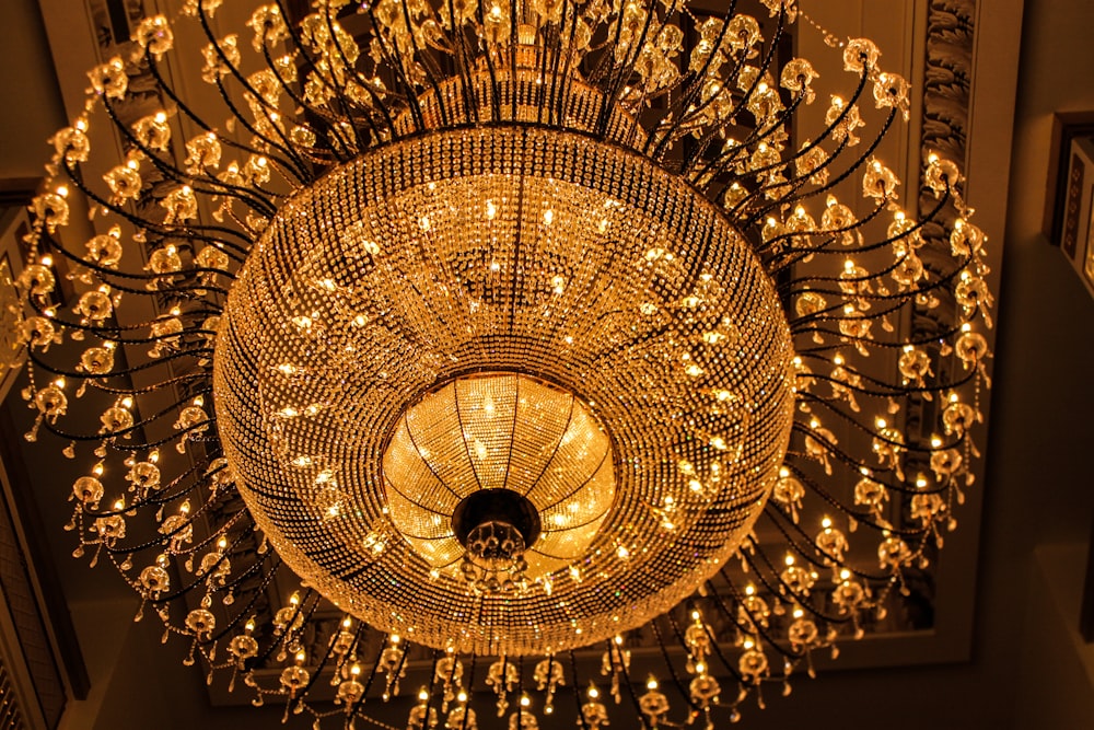 a chandelier hanging from the ceiling in a room