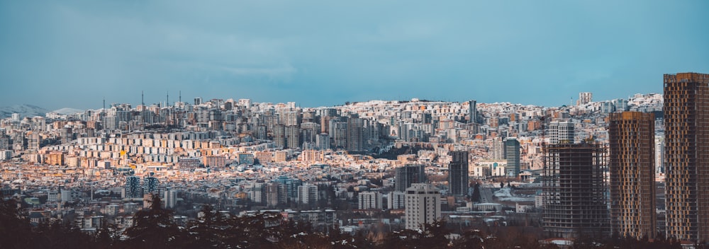 a view of a city with tall buildings