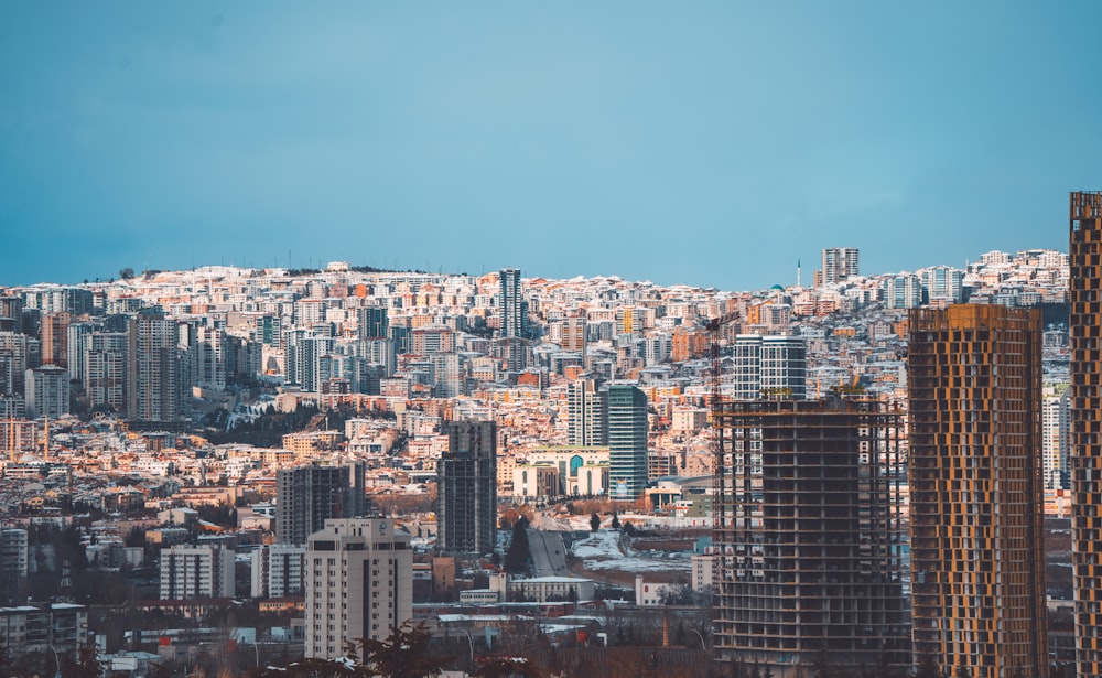 a view of a city with tall buildings