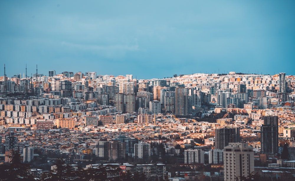 a view of a city with tall buildings