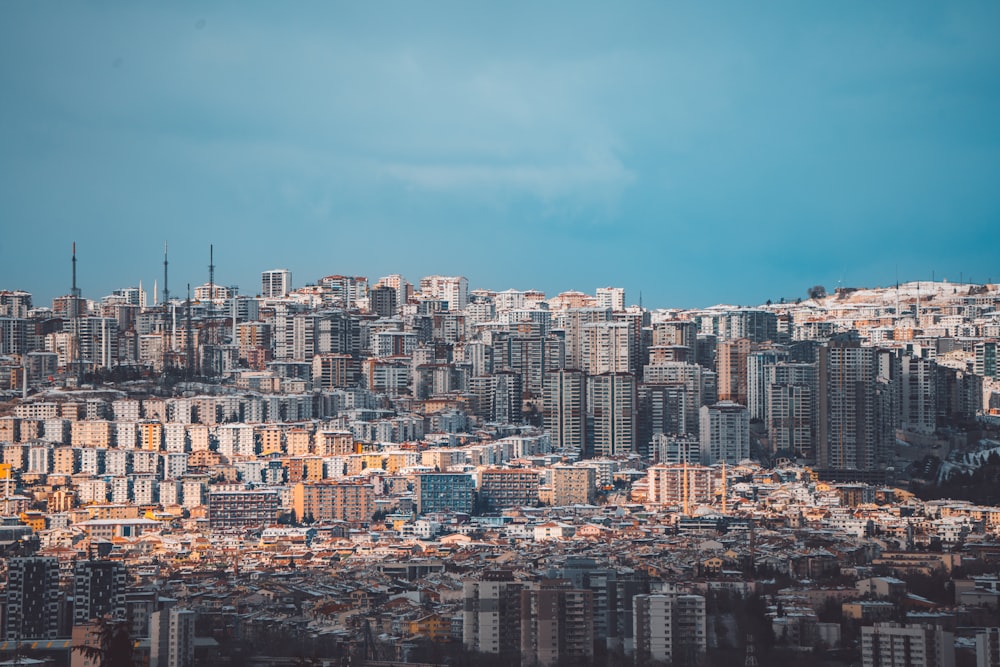 a view of a city with tall buildings