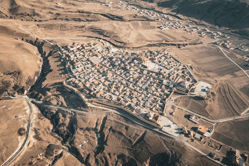 an aerial view of a small town in the desert