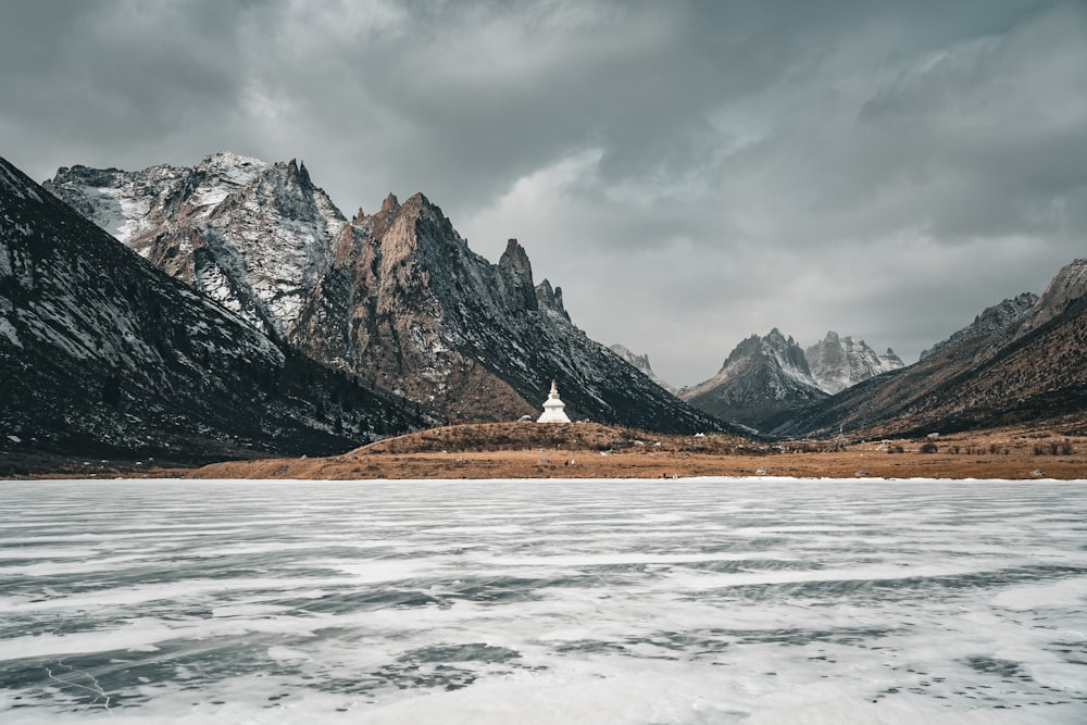 a lake with a mountain in the background