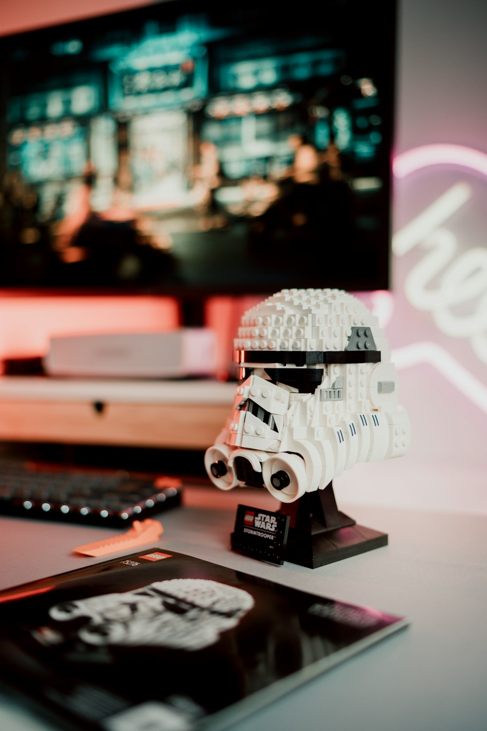 a lego model of a stormtrooper on a desk