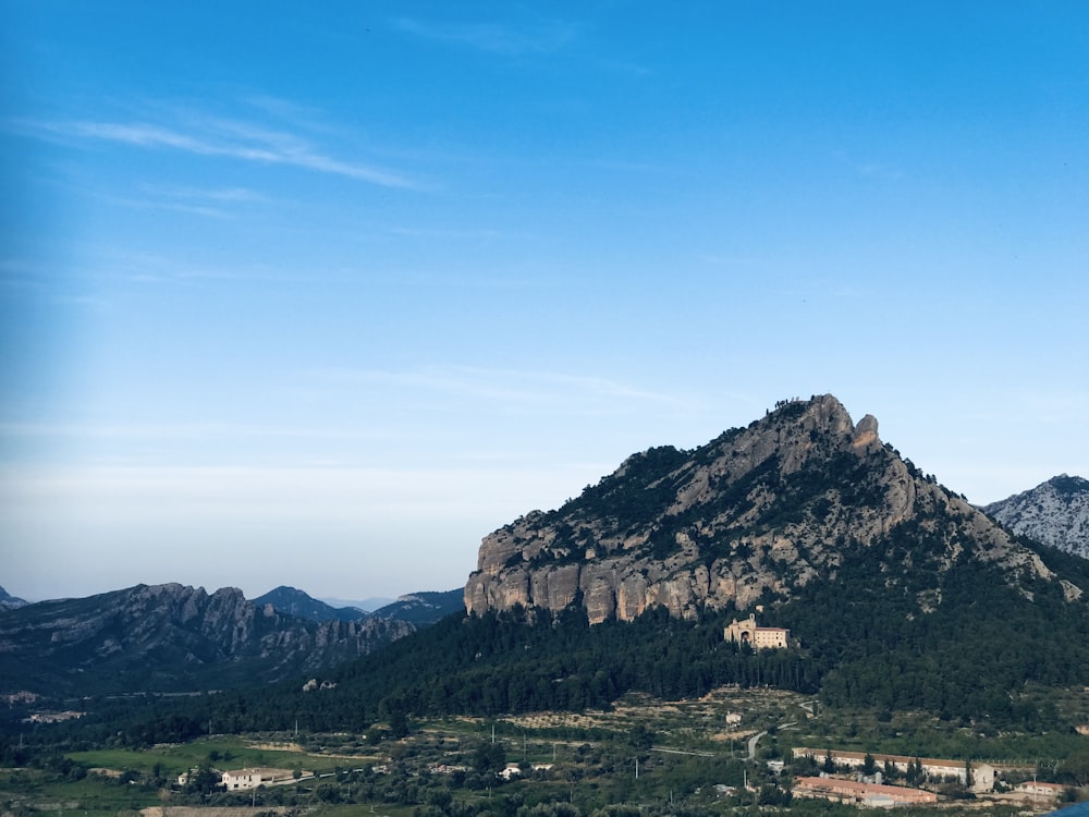 a mountain with a castle on top of it