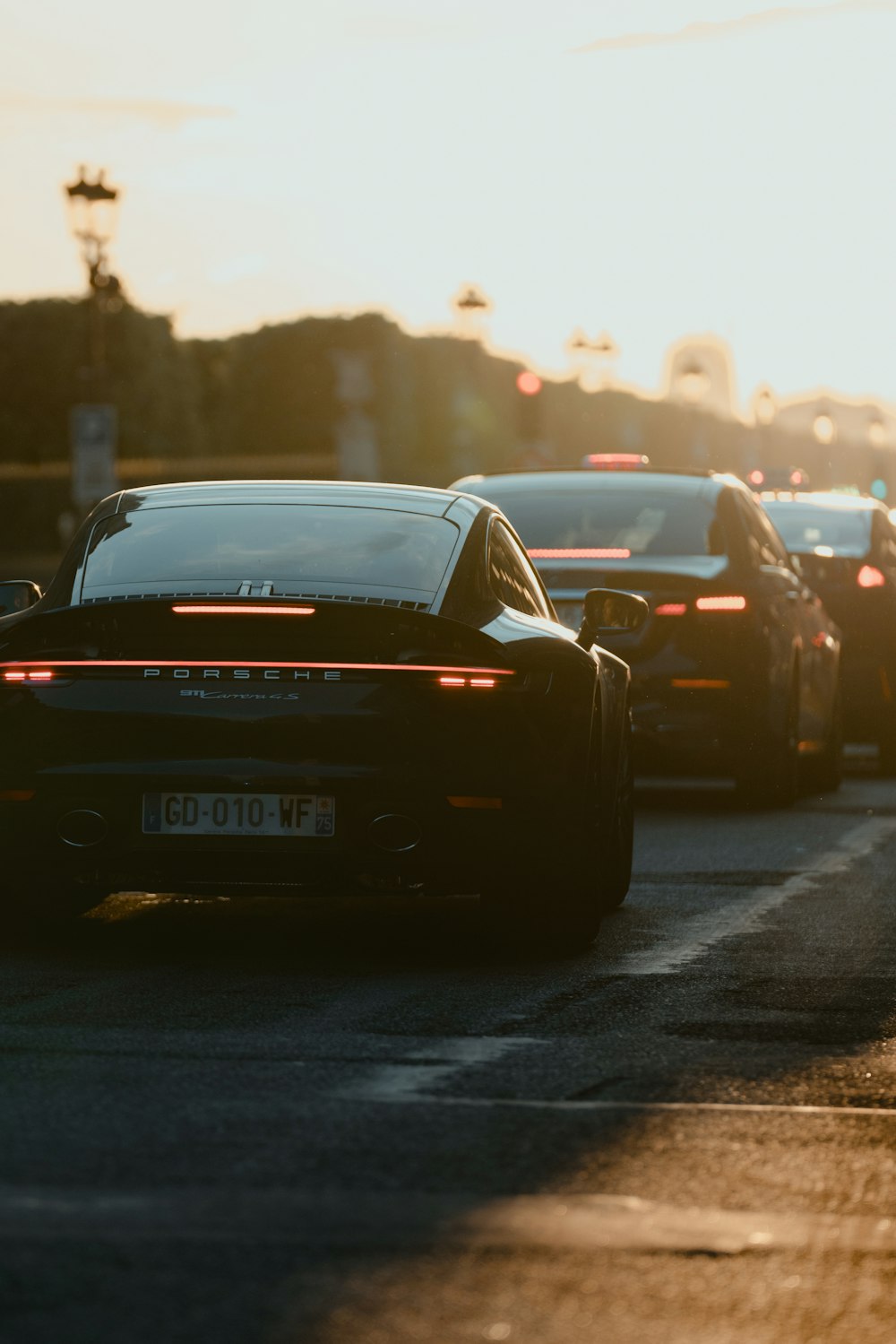 a bunch of cars that are sitting in the street