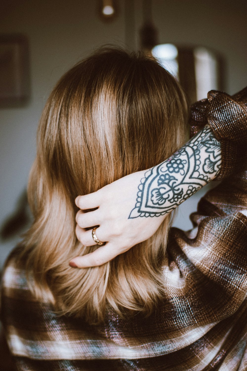 a woman with a tattoo on her arm