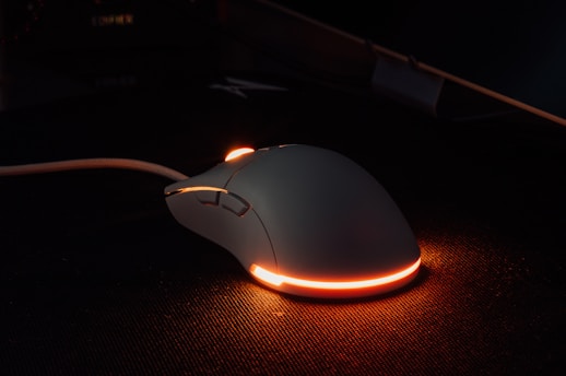 a computer mouse sitting on top of a desk