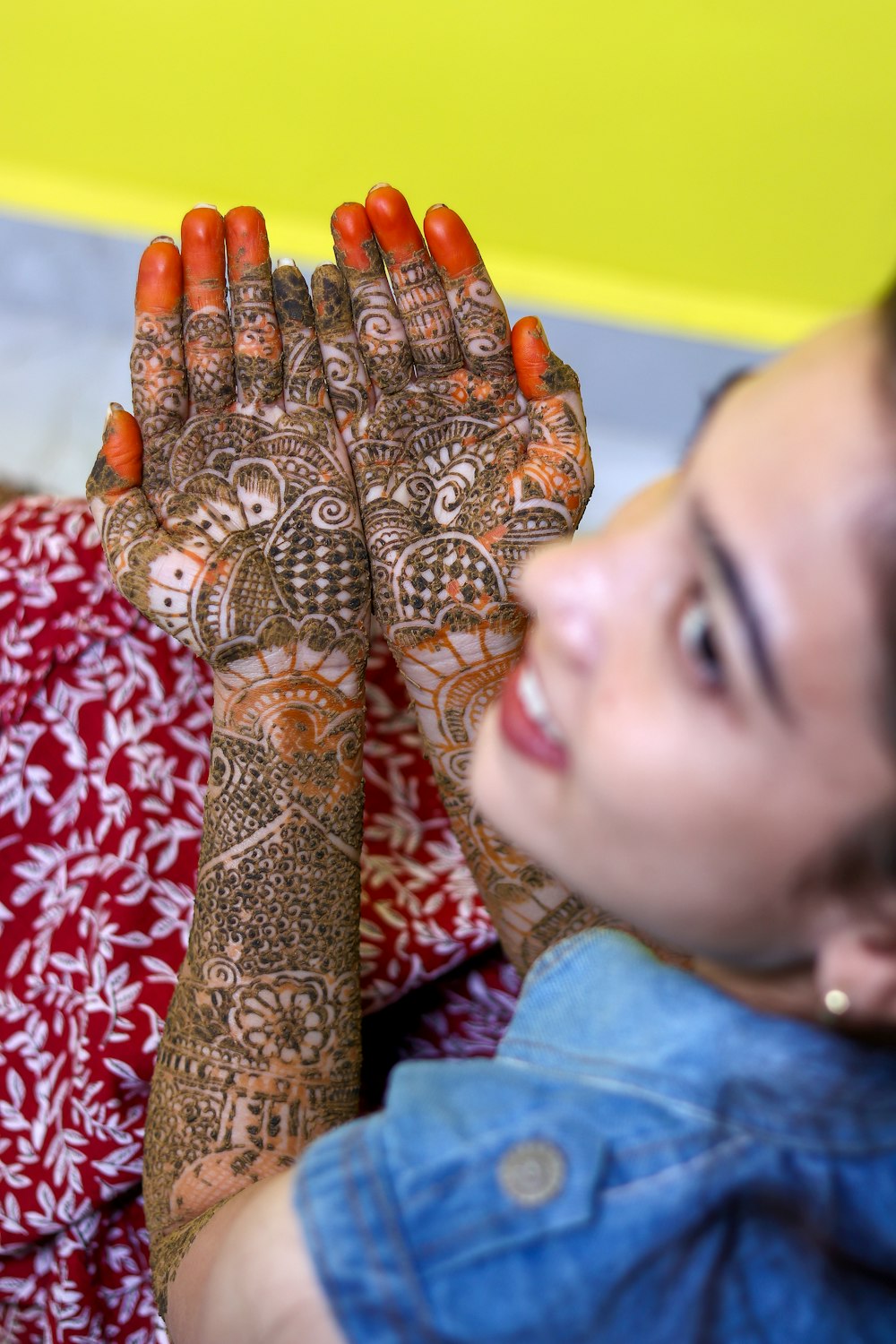 a woman with henna on her hands