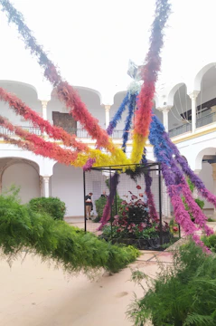 A vibrant art installation blending colors representing the four specialties of quatrefeuilles.