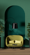 A stylish interior featuring a green circular-patterned wall, a lime green sofa with two matching cushions, a sleek black floor lamp, and a small black coffee table. The space is flanked by tall potted plants, and the wooden floor adds warmth to the modern aesthetic.