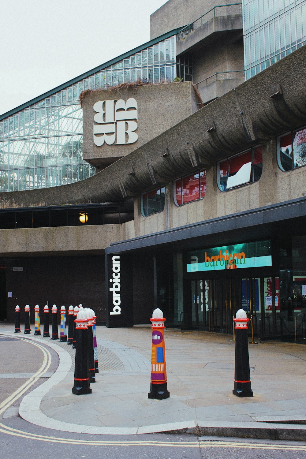 a group of traffic cones sitting in front of a building