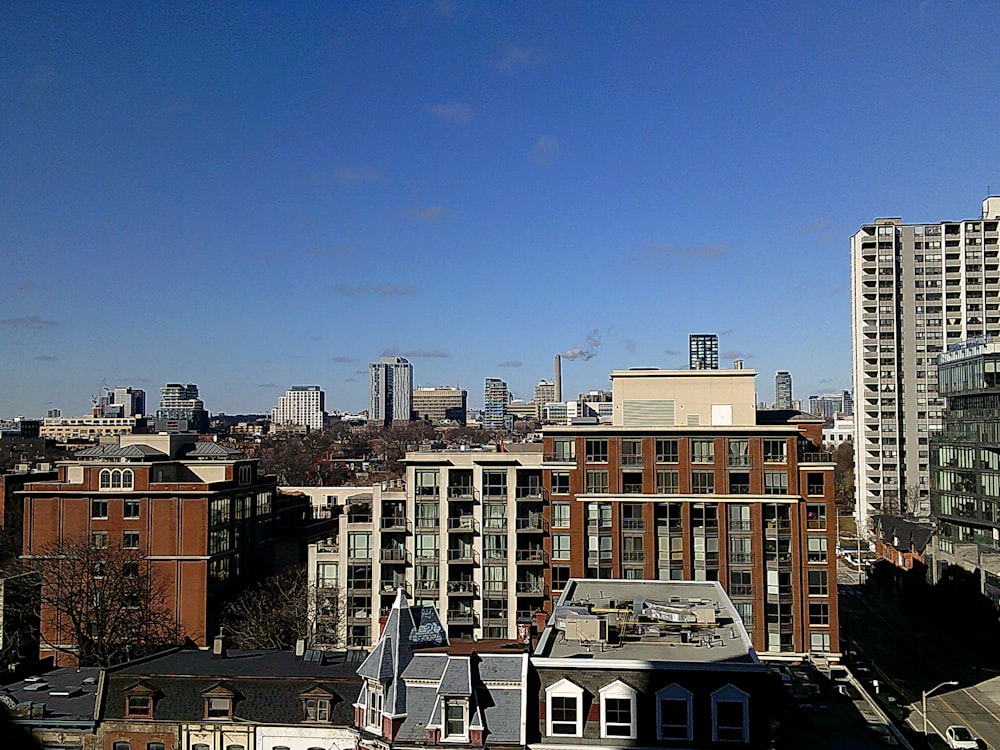 a view of a city with tall buildings