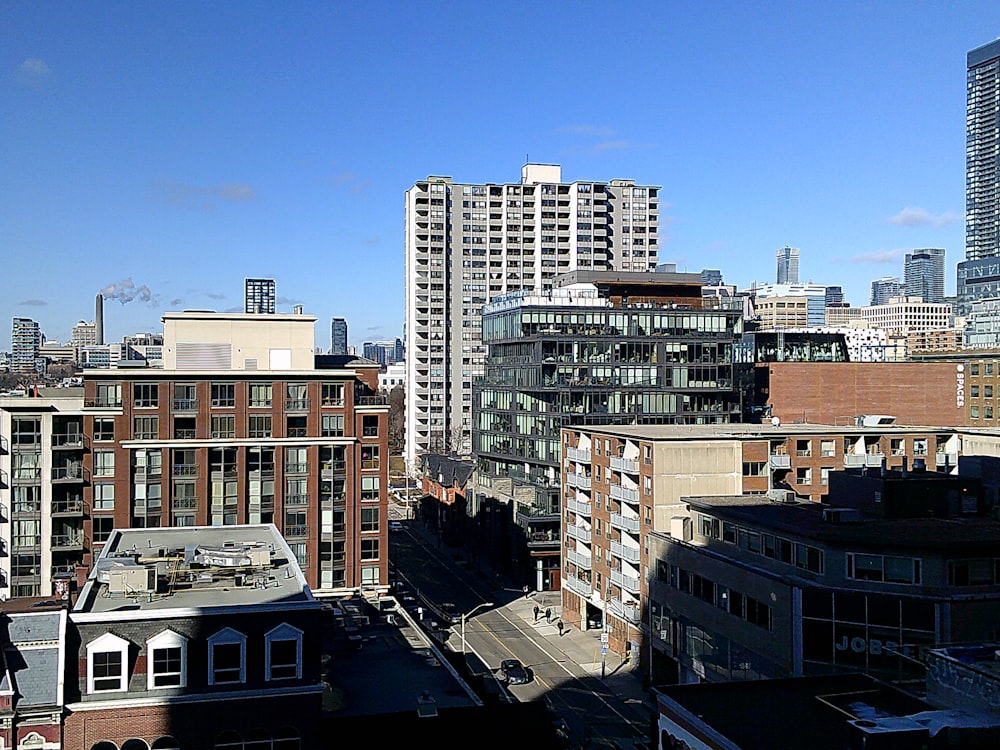 a view of a city with tall buildings