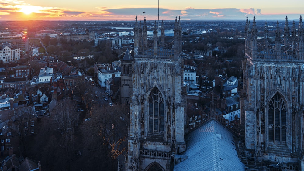 an aerial view of a city at sunset