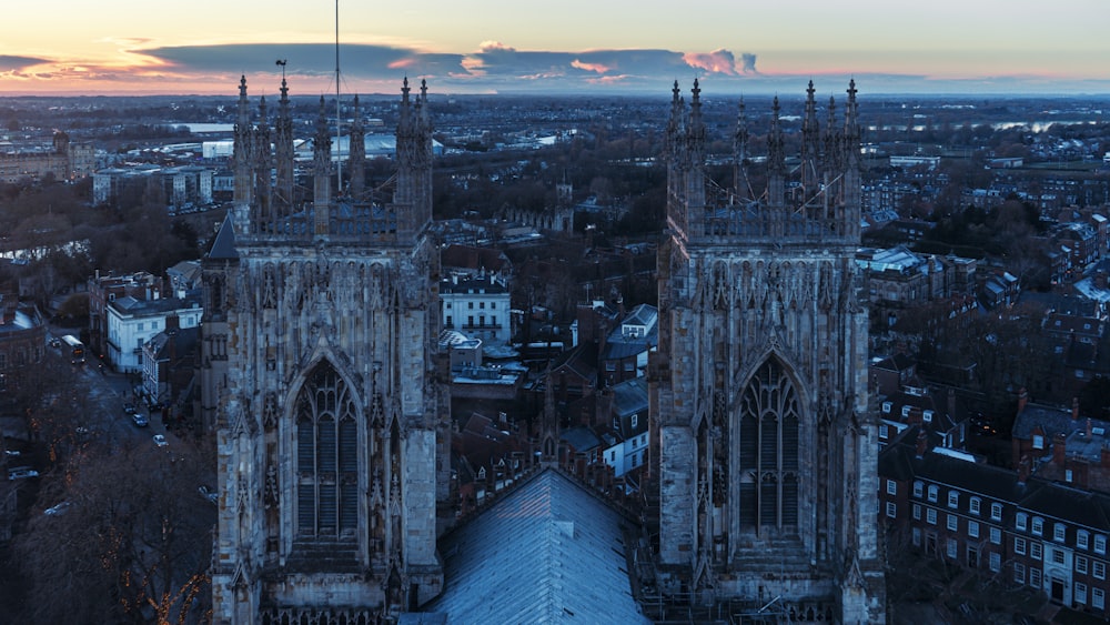 an aerial view of a city at sunset