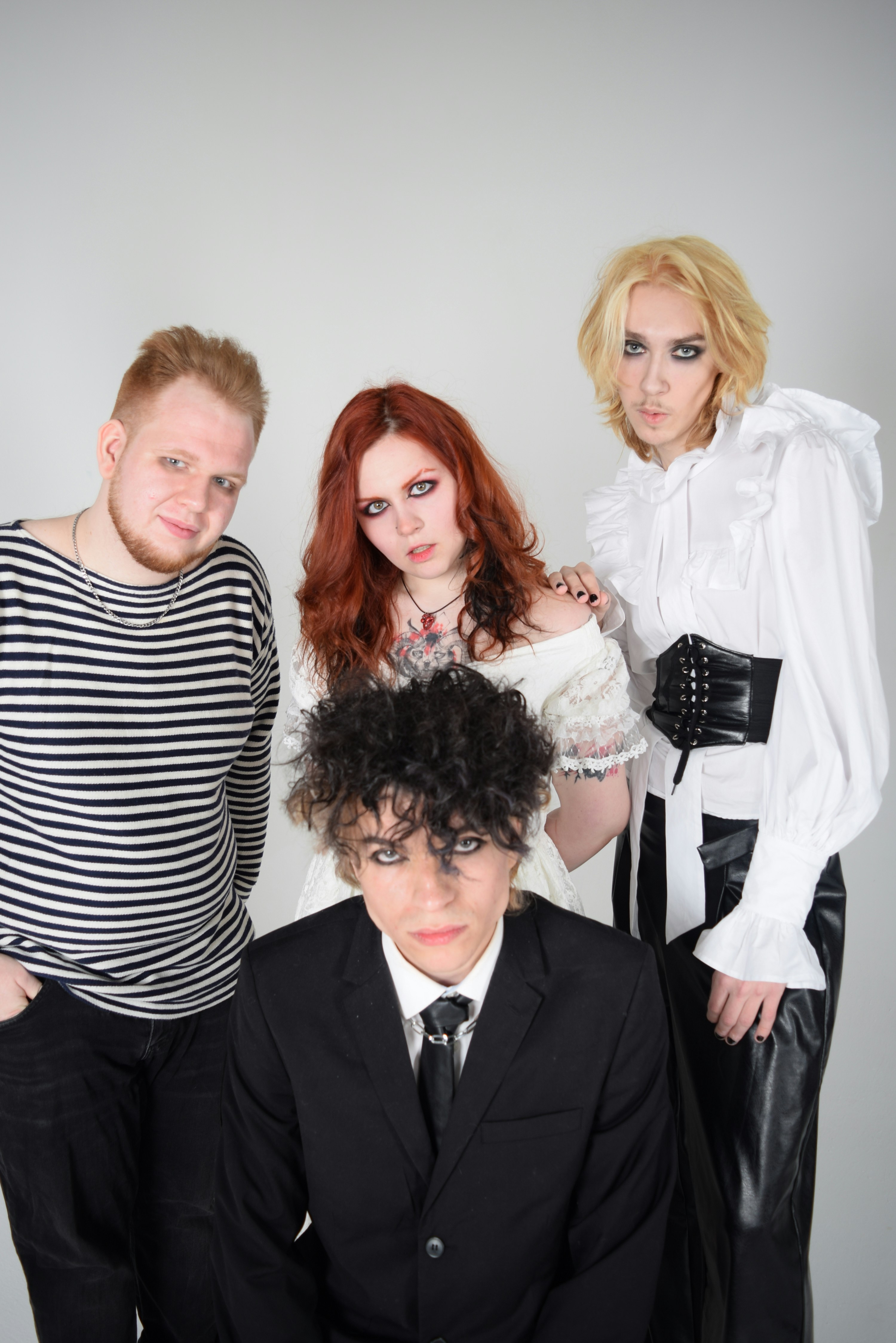 a group of people standing next to each other